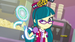 Size: 1920x1080 | Tagged: safe, screencap, juniper montage, equestria girls, equestria girls specials, g4, my little pony equestria girls: mirror magic, clothes, discovery family logo, evil smile, female, food, glasses, grin, hat, magic, mirror, pigtails, popcorn, smiling, solo, uniform