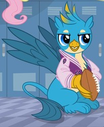 Size: 599x731 | Tagged: safe, screencap, fluttershy, gallus, griffon, g4, season 8, american football, claws, clothes, cropped, jacket, male, paws, solo focus, sports, varsity jacket, wings