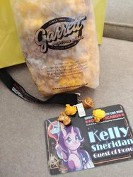 Size: 780x1040 | Tagged: artist needed, safe, sassy saddles, starlight glimmer, g4, clothes, dress, food, irl, kelly sheridan, photo, popcorn, whinnycitycon