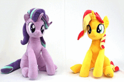 Size: 400x266 | Tagged: safe, artist:nekokevin, starlight glimmer, sunset shimmer, twilight sparkle, alicorn, pony, unicorn, series:nekokevin's glimmy, g4, 4de, animated, clothes, cute, female, gif, glimmerbetes, holding a pony, irl, looking down, mare, nekokevin is trying to murder us, photo, plushie, shimmerbetes, sitting, smiling, socks, starlight's little twibird, striped socks, twiabetes, twilight sparkle (alicorn)