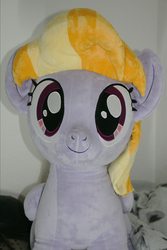 Size: 1824x2736 | Tagged: safe, cloud kicker, pegasus, pony, g4, bed, female, happy, irl, life size, looking at you, mare, photo, pillow, plushie, smiling, solo