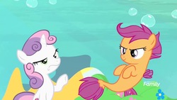 Size: 1280x720 | Tagged: safe, screencap, scootaloo, sweetie belle, pony, seapony (g4), unicorn, g4, surf and/or turf, bubble, crepuscular rays, dorsal fin, faic, female, filly, fin, fin wings, fins, fish tail, flower, flowing mane, flowing tail, ocean, sea-mcs, seaponified, seapony scootaloo, seaquestria, species swap, sunlight, swimming, tail, underwater, water, wings, your heart is in two places