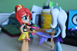 Size: 6000x4000 | Tagged: safe, artist:artofmagicpoland, sunset shimmer, trixie, equestria girls, g4, my little pony equestria girls: better together, clothes, doll, equestria girls minis, female, hat, holding, lesbian, ship:suntrix, shipping, toy, trixie's hat