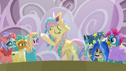 Size: 1920x1080 | Tagged: safe, screencap, fluttershy, gallus, ocellus, sandbar, silverstream, smolder, yona, pegasus, pony, g4, horse play, celestia costume, celestia's crown, clothes, clothing damage, cosplay, costume, crown, eyes closed, fake horn, female, flutterbeautiful, jewelry, mare, play, prosthetic butt, raised hoof, regalia, shylestia, spotlight, star swirl the bearded costume, student six