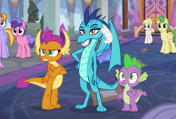 Size: 941x637 | Tagged: safe, screencap, auburn vision, berry blend, berry bliss, huckleberry, princess ember, smolder, spike, summer breeze, dragon, earth pony, pegasus, pony, school daze, annoyed, baby dragon, c:, claws, cropped, crossed arms, dragon trio, dragoness, female, friendship student, frown, glare, hand on hip, horns, lidded eyes, male, mare, narrowed eyes, slit pupils, smiling, smolder is not amused, stallion, teenaged dragon, teenager, trio, trio focus, unamused, unimpressed
