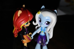 Size: 6000x4000 | Tagged: safe, artist:artofmagicpoland, sunset shimmer, trixie, equestria girls, g4, my little pony equestria girls: better together, clothes, doll, equestria girls minis, female, lesbian, looking at you, ship:suntrix, shipping, skirt, skirt pull, swimsuit, toy
