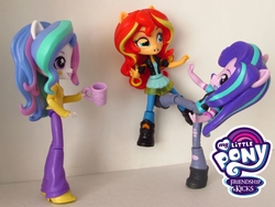 Size: 1500x1125 | Tagged: safe, artist:whatthehell!?, edit, princess celestia, principal celestia, starlight glimmer, sunset shimmer, equestria girls, g4, abuse, boots, clothes, cup, doll, dress, equestria girls minis, irl, jacket, kick, kicking, pants, parody, photo, shimmerbuse, shoes, smiling, toy