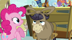 Size: 1280x720 | Tagged: safe, screencap, cranky doodle donkey, pinkie pie, donkey, earth pony, pony, a friend in deed, g4, bowtie, cart, duo, female, male, mare, ponyville, rearing