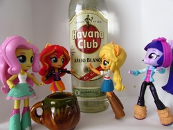 Size: 1320x990 | Tagged: safe, artist:whatthehell!?, fluttershy, sunset shimmer, twilight sparkle, equestria girls, g4, alcohol, boots, clothes, cuba, denim skirt, doll, equestria girls minis, eqventures of the minis, irl, jacket, jar, pants, photo, rum, shoes, skirt, smiling, spanish, spanish text, toy