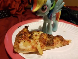 Size: 4032x3024 | Tagged: safe, rainbow dash, pony, g4, food, funko, irl, paper plate, photo, pineapple, pineapple pizza, pizza, plate, solo, toy, waifu dinner