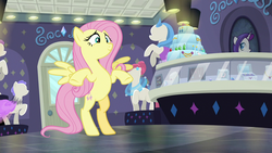 Size: 1280x720 | Tagged: safe, screencap, fluttershy, pegasus, pony, fake it 'til you make it, g4, bipedal, cute, female, mare, pose, rarity for you, shyabetes, smiling, spread wings, standing, wings