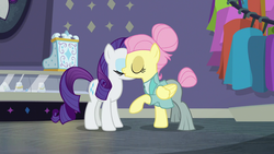 Size: 1920x1080 | Tagged: safe, screencap, fluttershy, rarity, pegasus, pony, unicorn, fake it 'til you make it, g4, cheek kiss, clothes, duo, eyes closed, female, hair bun, kissing, la bise, mare, out of context, platonic kiss, raised hoof, severeshy, shipping fuel