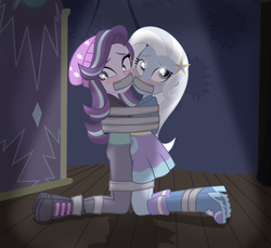 Size: 1617x1481 | Tagged: safe, artist:radiantrealm, starlight glimmer, trixie, equestria girls, g4, arm behind back, ass, beanie, blushing, bondage, boots, bound together, butt, clothes, commission, cute, female, gag, hat, help us, high heel boots, hoodie, kneeling, pants, shoes, show accurate, skirt, spotlight, tape bondage, tape gag, vest