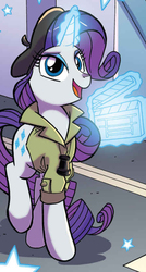 Size: 447x836 | Tagged: safe, artist:tonyfleecs, idw, official comic, rarity, pony, unicorn, g4, spoiler:comic, spoiler:comic66, beret, clapperboard, clothes, cropped, director, director rarity, female, glowing horn, hat, horn, magic, magic aura, mare, solo, telekinesis