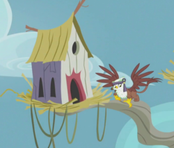 Size: 684x584 | Tagged: safe, screencap, gretchen, griffon, g4, the lost treasure of griffonstone, background griffon, bird house, cropped, female, headband, house, looking down, nest, solo, spread wings, tree branch, wings