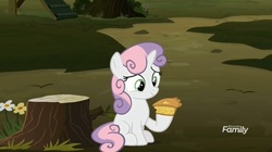 Size: 1653x923 | Tagged: safe, screencap, sweetie belle, pony, unicorn, g4, the break up breakdown, female, filly, food, hoof hold, pie, solo, tree stump