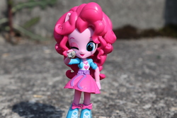 Size: 6000x4000 | Tagged: safe, artist:artofmagicpoland, pinkie pie, equestria girls, g4, doll, equestria girls minis, eqventures of the minis, female, fourth wall, irl, looking at you, one eye closed, photo, pointing, smiling, solo, stone, toy, wink