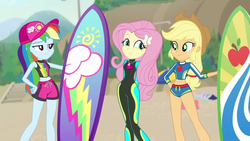 Size: 1280x720 | Tagged: safe, screencap, applejack, fluttershy, rainbow dash, blue crushed, equestria girls, g4, my little pony equestria girls: better together, adorasexy, applejack's beach shorts swimsuit, beach, clothes, cute, female, fluttershy's wetsuit, hips, sexy, shyabetes, surfboard, swimsuit, wetsuit