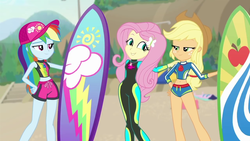 Size: 1280x720 | Tagged: safe, screencap, applejack, fluttershy, rainbow dash, blue crushed, equestria girls, equestria girls series, g4, applejack's beach shorts swimsuit, beach, board shorts, clothes, confused, cropped, crossed arms, faic, female, fluttershy's wetsuit, freckles, geode of fauna, geode of super strength, hat, jewelry, legs, lifeguard, looking at each other, necklace, sand, shipping fuel, shorts, smiling, stairs, surfboard, swimsuit, tree, trio, trio female, wetsuit