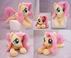 Size: 2388x1926 | Tagged: safe, artist:sophiesplushies, fluttershy, pony, g4, beanie (plushie), cute, irl, lying, photo, plushie, smiling, solo