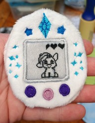 Size: 2323x3028 | Tagged: safe, artist:sew_adorkable, rarity, g4, fluffy, high res, irl, photo, plushie, ponygotchi, tamagotchi, toy