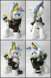 Size: 1024x1572 | Tagged: safe, artist:gingerale2016, rarity, pony, unicorn, g4, alternate hairstyle, chains, clothes, ear piercing, irl, jacket, leather jacket, lidded eyes, nose piercing, photo, piercing, plushie, punk, raripunk, solo, spiked wristband, wristband