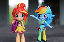 Size: 6000x4000 | Tagged: safe, artist:artofmagicpoland, rainbow dash, sunset shimmer, equestria girls, g4, my little pony equestria girls: better together, my little pony equestria girls: rainbow rocks, bag, clothes, doll, equestria girls minis, female, lesbian, looking at you, pointing, sarong, shipping, sunsetdash, swimsuit, toy