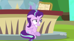 Size: 1920x1080 | Tagged: safe, screencap, starlight glimmer, pony, unicorn, g4, the parent map, book, discovery family logo, female, floppy ears, fountain, hiding, magic, mare, sitting, solo focus, telekinesis