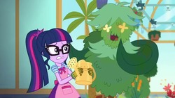 Size: 1280x720 | Tagged: safe, screencap, sci-twi, twilight sparkle, equestria girls, equestria girls series, g4, my little shop of horrors, apron, bowtie, celestia's house, clothes, geode of telekinesis, glasses, gloves, magical geodes, plants, ponytail, scared, singing, watering can