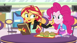 Size: 1280x720 | Tagged: safe, screencap, pinkie pie, sunset shimmer, equestria girls, equestria girls specials, g4, my little pony equestria girls: mirror magic, book, bracelet, burger, chair, discovery family logo, food, geode of empathy, geode of sugar bombs, hamburger, jewelry, journal, looking at each other, magical geodes, raised eyebrow, smiling, storefront, table, television, tray