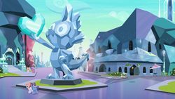 Size: 1280x720 | Tagged: safe, screencap, spike, crystal pony, pony, g4, the parent map, background pony, city, crystal empire, crystal griffon, spike statue, spike's statue, statue, town square