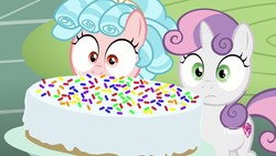 Size: 1920x1080 | Tagged: safe, screencap, cozy glow, sweetie belle, pegasus, pony, unicorn, g4, marks for effort, cake, discovery family logo, duo, duo female, female, filly, food, rainbow sprinkle, surprised, wide eyes