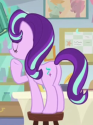 Size: 275x369 | Tagged: safe, screencap, starlight glimmer, pony, unicorn, g4, marks for effort, book, butt, cropped, eyes closed, female, mare, plot, raised hoof, solo, starlight's office, stool, underhoof