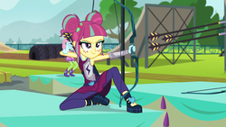 Size: 1920x1080 | Tagged: safe, screencap, fluttershy, sour sweet, equestria girls, g4, my little pony equestria girls: friendship games, archery, arrow, bow (weapon), bow and arrow, female, smiling, smirk, weapon