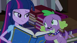 Size: 1920x1080 | Tagged: safe, screencap, spike, twilight sparkle, alicorn, dog, equestria girls, g4, my little pony equestria girls, book, clothes, collar, embarrassed, female, smiling, smirk, spike the dog, twilight sparkle (alicorn), yearbook