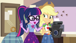 Size: 1280x720 | Tagged: safe, screencap, applejack, sci-twi, twilight sparkle, equestria girls, g4, my little pony equestria girls: better together, outtakes (episode), animal shelter, camera, duo, geode of super strength, geode of telekinesis