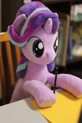Size: 200x300 | Tagged: safe, alternate version, artist:nekokevin, starlight glimmer, pony, unicorn, series:nekokevin's glimmy, g4, animated, chair, cute, desk, drawing, female, gif, glimmerbetes, irl, life size, mare, paper, pencil, photo, plushie, smiling, solo, stop motion