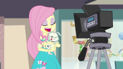 Size: 1280x720 | Tagged: safe, screencap, fluttershy, dog, equestria girls, equestria girls series, g4, outtakes (episode), camera, female, pup-pup
