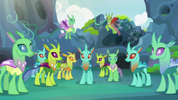 Size: 1280x720 | Tagged: safe, screencap, arista, clypeus, cornicle, frenulum (g4), lokiax, soupling, changedling, changeling, g4, to change a changeling, background changeling, changeling hive, crowd, looking at you