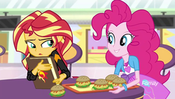 Size: 1280x720 | Tagged: safe, screencap, pinkie pie, sunset shimmer, equestria girls, equestria girls specials, g4, mirror magic, book, bracelet, burger, chair, discovery family logo, food, geode of empathy, geode of sugar bombs, hamburger, jewelry, journal, looking at each other, magical geodes, smiling, storefront, table, television, tray