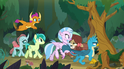 Size: 1280x720 | Tagged: safe, screencap, gallus, ocellus, sandbar, silverstream, smolder, yona, changedling, changeling, classical hippogriff, griffon, hippogriff, g4, non-compete clause, forest, smug, student six