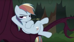 Size: 1587x896 | Tagged: safe, screencap, mean rainbow dash, pony, g4, the mean 6, clone, crossed legs, evil rainbow dash, female, frown, lidded eyes, scrunchy face, solo, straw in mouth, tree, tree branch, upside down cutie mark