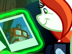 Size: 813x615 | Tagged: safe, edit, edited screencap, screencap, crackle cosette, queen chrysalis, g4, the mean 6, camera, chrysalis' picture, clash of hasbro's titans, cropped, disguise, disguised changeling, exploitable, optimus prime, transformers