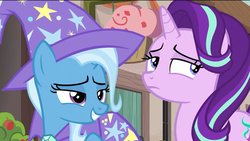 Size: 1200x675 | Tagged: safe, screencap, starlight glimmer, trixie, pony, unicorn, g4, to where and back again, duo, grin, looking away, smiling