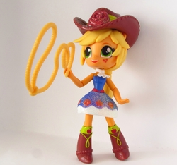 Size: 1263x1183 | Tagged: safe, artist:whatthehell!?, applejack, equestria girls, g4, boots, clothes, cowboy, cowboy boots, cowboy hat, doll, dress, equestria girls minis, female, flower, hat, irl, photo, rope, rose, skirt, stetson, toy