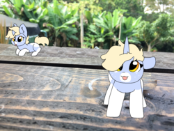 Size: 1280x960 | Tagged: safe, artist:nootaz, oc, oc:nootaz, pony, unicorn, :p, cute, female, floppy ears, hair over one eye, irl, looking at you, mare, photo, ponies in real life, ponified animal photo, prone, self ponidox, silly, smiling, tongue out