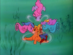Size: 710x540 | Tagged: safe, screencap, applejack (g1), megan williams, sealight, seawinkle, wavedancer, earth pony, human, pony, sea pony, g1, rescue at midnight castle, bubble, call upon the sea ponies, cropped, female, in bubble, mare, underwater