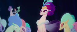 Size: 1920x804 | Tagged: safe, screencap, princess skystar, queen novo, seapony (g4), g4, my little pony: the movie, background sea pony, bubble, clothes, collar, crown, dorsal fin, eyelashes, eyeshadow, female, fin, fin wings, fins, fish tail, flower, flower in hair, flowing mane, freckles, glowing, jewelry, lidded eyes, looking at each other, looking at someone, makeup, mother and child, mother and daughter, necklace, ocean, pearl necklace, purple eyes, purple mane, queen novo's orb, regalia, scales, seaquestria, see-through, smiling, smiling at each other, spread wings, swimming, tail, teeth, throne, throne room, underwater, water, wings