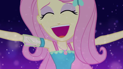 Size: 1280x720 | Tagged: safe, screencap, fluttershy, equestria girls, g4, my little pony equestria girls: better together, so much more to me, animation error, armpits, cute, female, geode of fauna, happy, magical geodes, mawshot, open mouth, outstretched arms, shyabetes, singing, solo, volumetric mouth