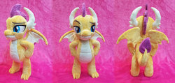Size: 1023x486 | Tagged: safe, artist:plushypuppy, smolder, dragon, g4, dragoness, female, grin, hand on hip, irl, lidded eyes, photo, plushie, smiling, solo, standing, wings